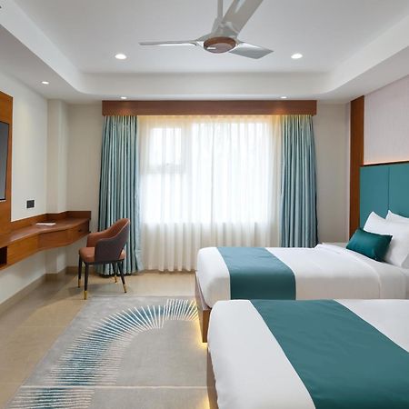 Kowju Airport Hotel Calicut Kondotty Extérieur photo
